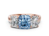 Rose gold Fancy Blue Radiant Cut Three-Stone Diamond Ring with Prong Setting on a Classic Band_12