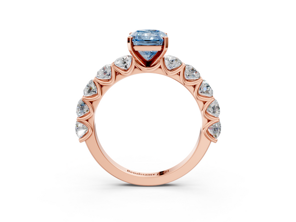 Rose gold Fancy Blue Radiant Cut Diamond Prong Setting with Side Stones on a Pave Band