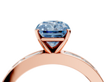 Rose gold Fancy Blue Radiant  Solitaire Diamond Ring with Channel-Set Baguette Band and Four-Prong Setting_85
