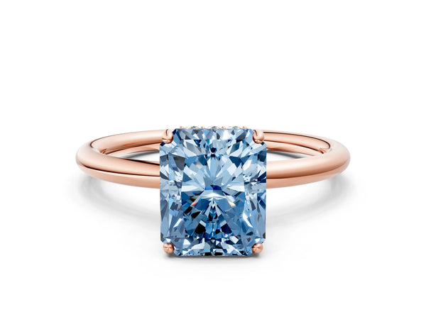 Rose gold Fancy Blue Radiant  Solitaire Diamond Ring with a Classic Band and Four-Prong Setting