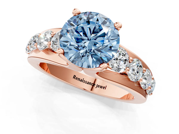 Rose gold Fancy Blue Round  Brilliant Solitaire with Side Stones on a Pave Band and Four-Prong Setting