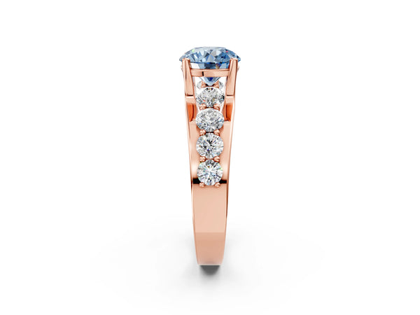 Rose gold Fancy Blue Round  Brilliant Solitaire with Side Stones on a Pave Band and Four-Prong Setting
