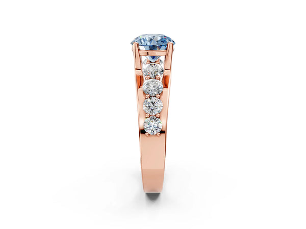 Rose gold Fancy Blue Round  Brilliant Solitaire with Side Stones on a Pave Band and Four-Prong Setting