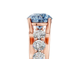 Rose gold Fancy Blue Round  Brilliant Solitaire with Side Stones on a Pave Band and Four-Prong Setting_95