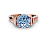 Rose gold Fancy Blue Round Cut Brilliant Solitaire Diamond Ring with Channel Set Band and Bar Prong Setting