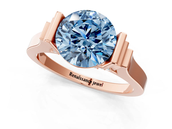 Rose gold Fancy Blue Round Cut Brilliant Solitaire Diamond Ring with Channel Set Band and Bar Prong Setting
