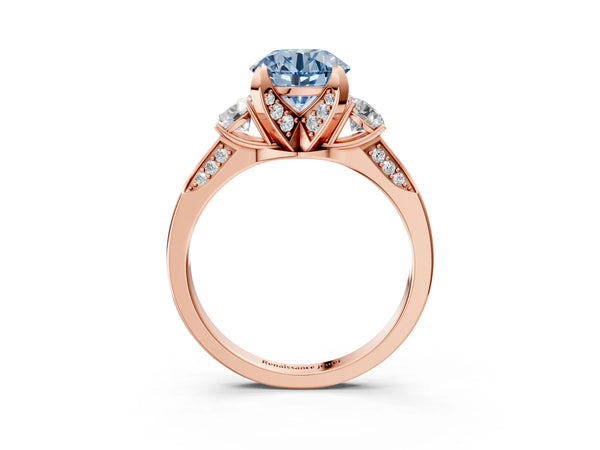 Rose gold Fancy Blue Round Cut Brilliant Three-Stone Diamond Ring with Pavé Band and Four-Prong Setting