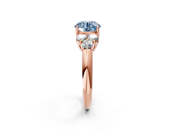 Rose gold Fancy Blue Round  Cut Diamond Cluster Ring with Round Accent Stones and Prong Setting on a Classic Band