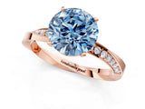 Rose gold Fancy Blue Round Cut Diamond Engagement Ring with Side Stone Accents and Four-Prong Setting_73