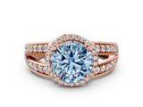 Rose gold Fancy Blue Round Cut Diamond Halo Ring with Split Shank Pavé Band and Four-Prong Setting