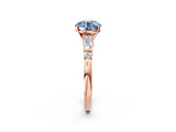 Rose gold Fancy Blue Round  Cut Diamond Ring with Baguette Side Stones, Channel Set Band, and Four-Prong Setting_38