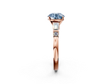 Rose gold Fancy Blue Round  Cut Diamond Ring with Baguette Side Stones, Channel Set Band, and Four-Prong Setting_5
