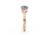 Rose gold Fancy Blue Round  Cut Diamond Ring with Tapered Baguette Side Stones in Four-Prong Setting_5