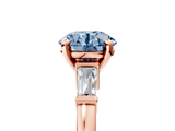 Rose gold Fancy Blue Round  Cut Diamond Solitaire Ring with Tapered Baguette Accents and Four-Prong Setting_81