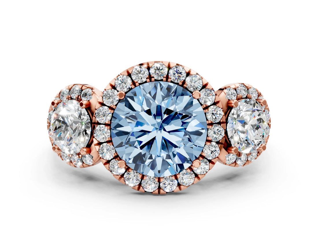 Rose gold Fancy Blue Round Cut Diamond Three-Stone Halo Ring with Prong Setting and Pavé Accents