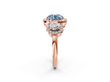 Rose gold Fancy Blue Round Cut Diamond Three-Stone Halo Ring with Prong Setting and Pavé Accents_2