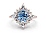 Rose gold Fancy Blue Round Cut Halo Diamond Cluster Ring with Marquise and Round Stones on a White Gold Band with Prong Setting