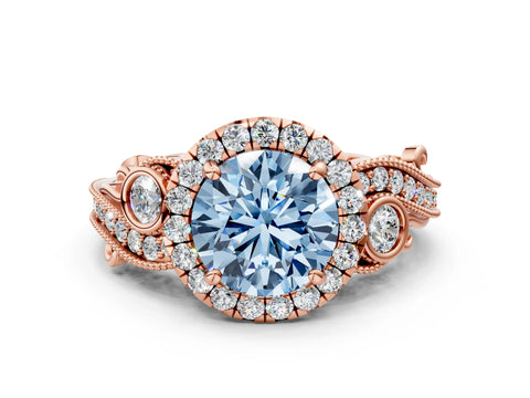 Rose gold Fancy Blue Round Cut Halo Diamond Ring with Milgrain and Bezel Accents on a Split Shank Band