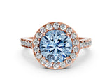 Rose gold Fancy Blue Round Cut Halo Diamond Ring with Pavé Band and Three-Prong Setting
