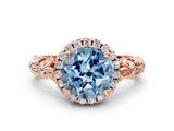 Rose gold Fancy Blue Round Cut Halo Diamond Solitaire with Filigree Band and Four-Prong Setting