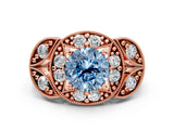 Rose gold Fancy Blue Round Cut Halo Milgrain Diamond Engagement Ring with Leaf Band and Four-Prong Setting