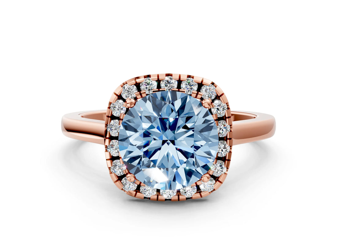 Rose gold Fancy Blue Round Cut Halo Round Diamond Solitaire Ring with Pavé Band and Four-Prong Setting
