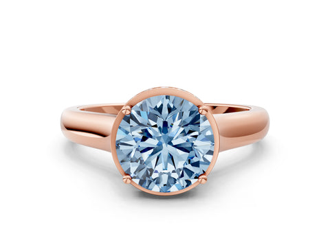 Rose gold Fancy Blue Round Cut Solitaire Diamond Engagement Ring with Four-Prong Setting and Tapered Band