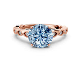 Rose gold Fancy Blue Round Cut Solitaire Diamond Ring with Infinity Twist Band and Four-Prong Setting_12