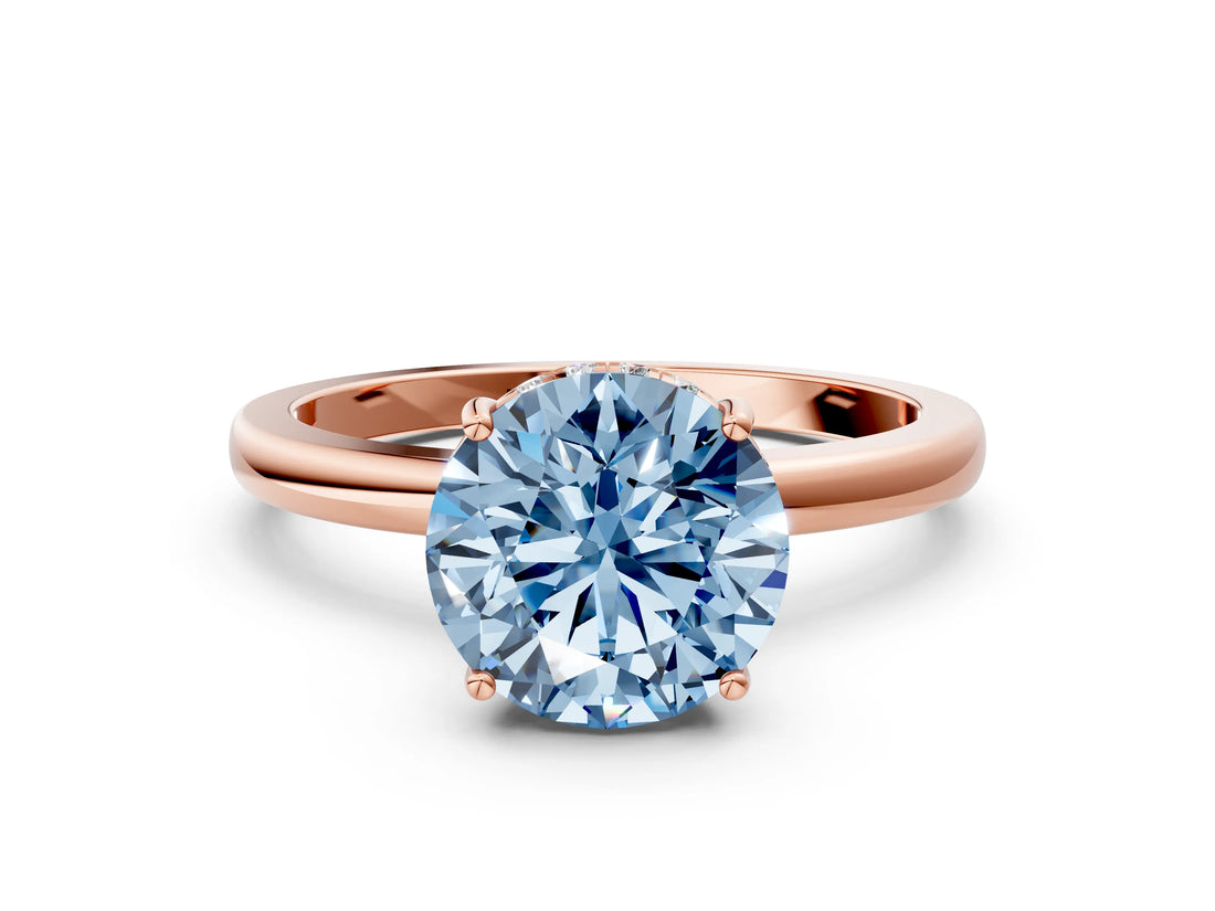 Rose gold Fancy Blue Round Cut Solitaire Diamond Ring with Prong Setting and Plain Band