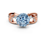 Rose gold Fancy Blue Round  Cut Solitaire Diamond with Side Stones on Criss-Cross Band and Four-Prong Setting_3