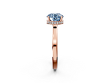 Rose gold Fancy Blue Round  Cut Solitaire Engagement Ring with Four-Prong Setting on a Classic Band_38