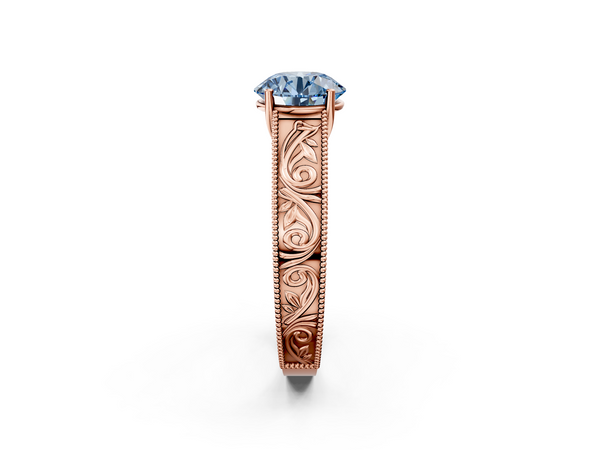 Rose gold Fancy Blue Round Cut Diamond Solitaire Ring with Engraved Band and Four-Prong Setting