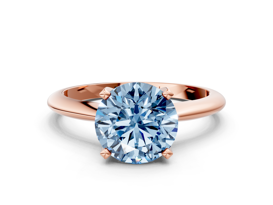 Rose gold Fancy Blue Round  Cut Solitaire Ring with Four-Prong Setting on a Classic Band_28