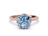 Rose gold Fancy Blue Round Cut Solitaire Split Shank Pave Diamond Engagement Ring with Four-Prong Setting