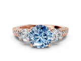 Rose gold Fancy Blue Round Cut Three-Stone Diamond Ring with Pavé Band and Four-Prong Setting