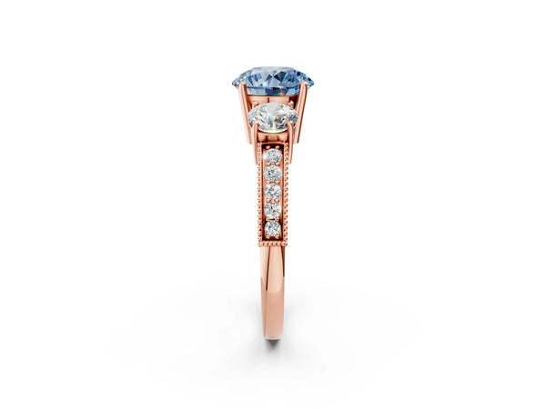 Rose gold Fancy Blue Round Cut Three-Stone Diamond Ring with Pavé Band and Four-Prong Setting