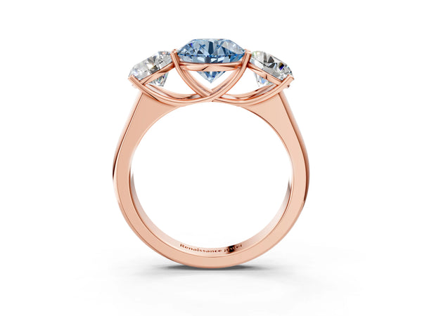 Rose gold Fancy Blue Round Cut Three-Stone Diamond Ring with Prong Setting on a Classic Band