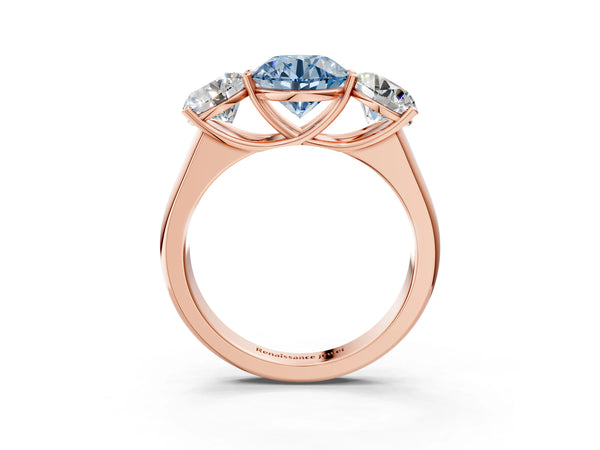 Rose gold Fancy Blue Round Cut Three-Stone Diamond Ring with Prong Setting on a Classic Band