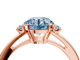 Rose gold Fancy Blue Round  Cut Three-Stone Solitaire Ring with Round Accent Diamonds and Four-Prong Setting_24
