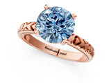 Rose gold Fancy Blue Round  Solitaire Diamond Engagement Ring with XO Engraved Band and Four-Prong Setting 1