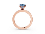 Rose gold Fancy Blue Round  Solitaire Diamond Ring with Channel-Set Baguette Band and Four-Prong Setting_91