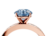 Rose gold Fancy Blue Round  Solitaire Diamond Ring with Channel-Set Baguette Band and Four-Prong Setting_92