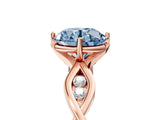 Rose gold Fancy Blue Round  Solitaire Twist Band with Leaf Prong Setting