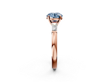 Rose gold Fancy Blue Round  Solitaire with Tapered Baguette Side Stones on a Classic Band with Four-Prong Setting_93