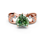 Rose gold Fancy Green Heart  Cut Solitaire Diamond with Side Stones on Criss-Cross Band and Four-Prong Setting