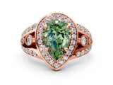 Rose gold Fancy Green Pear Cut Diamond Halo Ring with Split Shank and Bezel Accents and Four-Prong Setting
