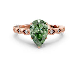 Rose gold Fancy Green Pear Cut Solitaire Diamond Ring with Infinity Twist Band and Four-Prong Setting