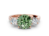 Rose gold Fancy Green Round Cut Diamond Three-Stone Engagement Ring with Prong Setting and Pavé Band