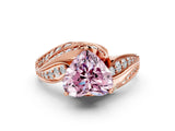 Rose gold Fancy Pink Heart Cut Diamond Solitaire Ring with Prong Setting and Twisted Pavé Band