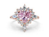 Rose gold Fancy Pink Heart Cut Halo Diamond Cluster Ring with Marquise and Round Stones on a White Gold Band with Prong Setting